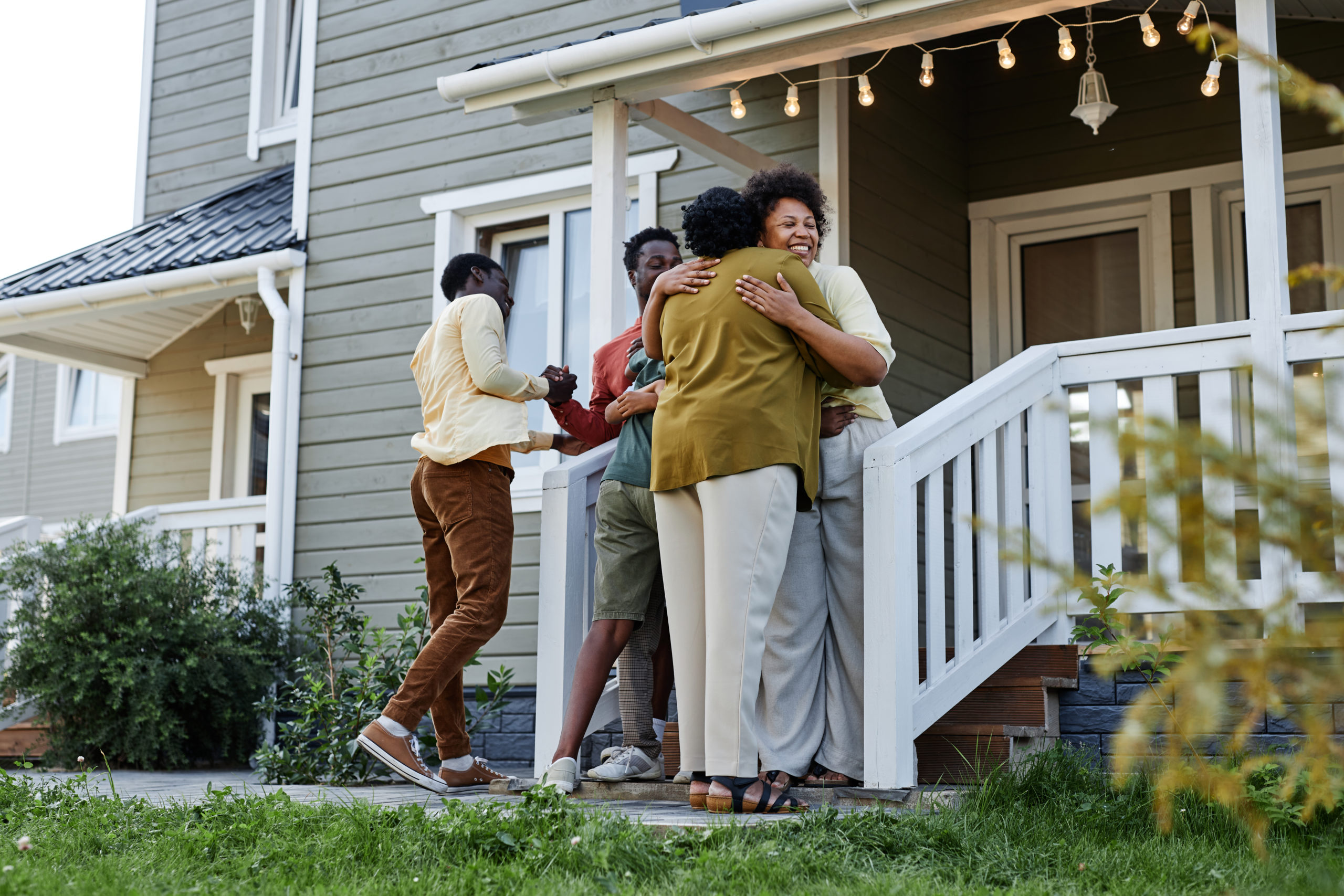 https://drtranforcongress.com/wp-content/uploads/2023/07/full-length-portrait-happy-black-family-embracing-porch-new-house-copy-space-scaled.jpeg